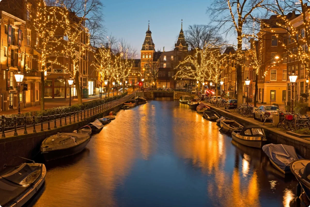 the canals with lights in the winter amsterdam